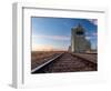 Grain elevator and railroad track, Milk River, Alberta, Canada-null-Framed Photographic Print