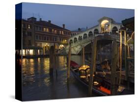Grand Canal, Rialto Bridge at Night, Gondolas on Waterfront, Venice, Veneto, Italy-Christian Kober-Stretched Canvas