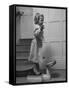 Grand Daughter of Winston Churchill, Arabella Spencer Churchill, Jouncing on Bathroom Scale-Carl Mydans-Framed Stretched Canvas
