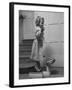 Grand Daughter of Winston Churchill, Arabella Spencer Churchill, Jouncing on Bathroom Scale-Carl Mydans-Framed Premium Photographic Print