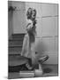 Grand Daughter of Winston Churchill, Arabella Spencer Churchill, Jouncing on Bathroom Scale-Carl Mydans-Mounted Premium Photographic Print