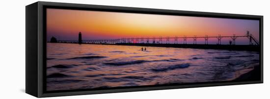 Grand Haven Lighthouse at sunset, Grand Haven, Michigan, USA-null-Framed Stretched Canvas