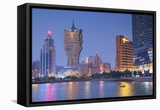 Grand Lisboa and Wynn Hotel and Casino at Dusk, Macau, China, Asia-Ian Trower-Framed Stretched Canvas