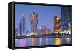 Grand Lisboa and Wynn Hotel and Casino at Dusk, Macau, China, Asia-Ian Trower-Framed Stretched Canvas