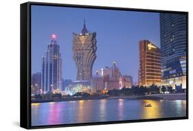 Grand Lisboa and Wynn Hotel and Casino at Dusk, Macau, China, Asia-Ian Trower-Framed Stretched Canvas