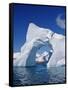 Grandidier Channel, Tourists Zodiac Cruising by Arched Iceberg Near Booth Island, Antarctica-Allan White-Framed Stretched Canvas