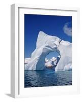 Grandidier Channel, Tourists Zodiac Cruising by Arched Iceberg Near Booth Island, Antarctica-Allan White-Framed Photographic Print