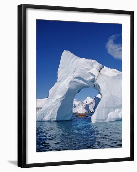 Grandidier Channel, Tourists Zodiac Cruising by Arched Iceberg Near Booth Island, Antarctica-Allan White-Framed Photographic Print