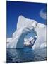 Grandidier Channel, Tourists Zodiac Cruising by Arched Iceberg Near Booth Island, Antarctica-Allan White-Mounted Photographic Print