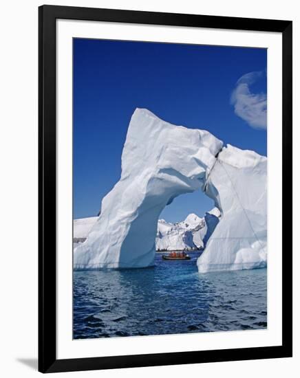 Grandidier Channel, Tourists Zodiac Cruising by Arched Iceberg Near Booth Island, Antarctica-Allan White-Framed Photographic Print