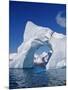 Grandidier Channel, Tourists Zodiac Cruising by Arched Iceberg Near Booth Island, Antarctica-Allan White-Mounted Photographic Print