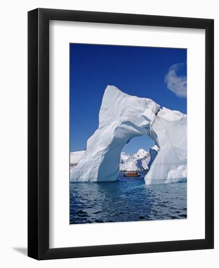 Grandidier Channel, Tourists Zodiac Cruising by Arched Iceberg Near Booth Island, Antarctica-Allan White-Framed Photographic Print