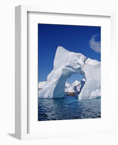 Grandidier Channel, Tourists Zodiac Cruising by Arched Iceberg Near Booth Island, Antarctica-Allan White-Framed Photographic Print