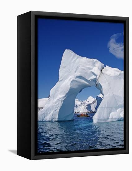 Grandidier Channel, Tourists Zodiac Cruising by Arched Iceberg Near Booth Island, Antarctica-Allan White-Framed Stretched Canvas