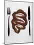 Grated Chocolate Between Knife and Fork-null-Mounted Photographic Print