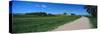 Gravel and dirt road through farm, North Dakota, USA-null-Stretched Canvas