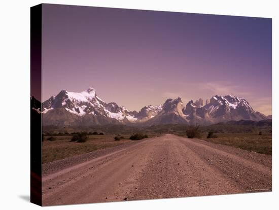 Gravel Road and Cuernos Del Paine, Torres Del Paine National Park, Patagonia, Chile, South America-Jochen Schlenker-Stretched Canvas