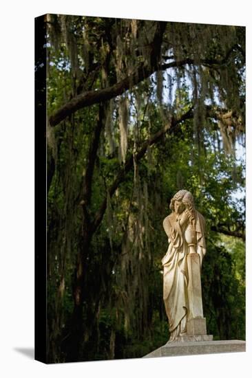 Graveyard Statue and Trees Draped in Spanish Moss at Entrance to Bonaventure Cemetery-Paul Souders-Stretched Canvas