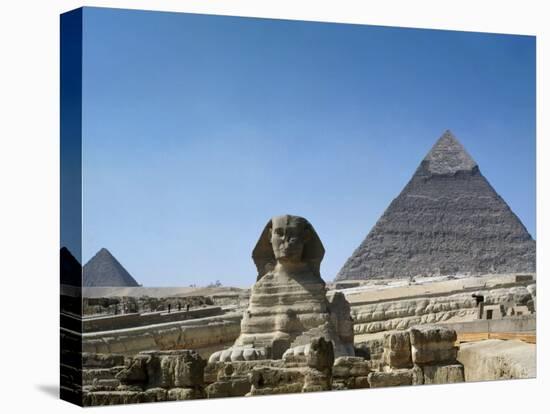 Great Sphinx and Pyramid of Khephren and Menkaure (to left) 4th dynasty, Giza, Egypt-null-Stretched Canvas