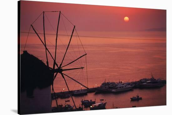 Greece, Cyclades Islands, Mykonos. Boni Windmill and Mykonos Harbor-Walter Bibikow-Stretched Canvas