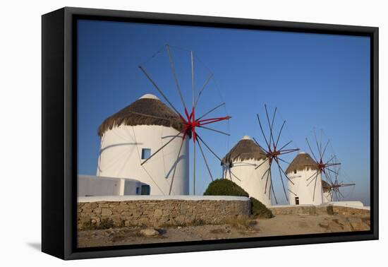 Greece, Mykonos. Windmills along the water-Hollice Looney-Framed Stretched Canvas