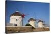 Greece, Mykonos. Windmills along the water-Hollice Looney-Stretched Canvas