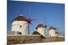 Greece, Mykonos. Windmills along the water-Hollice Looney-Mounted Photographic Print