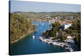 Greece, Paxos. Yachts and Pleasure Boats Moored in the Entrance to Gaios Harbour-John Warburton-lee-Stretched Canvas