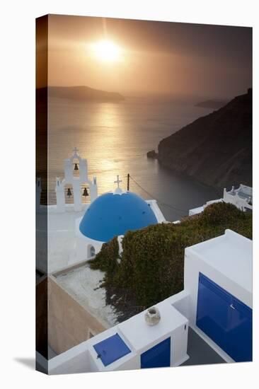 Greece, Santorini. Blue dome and bell tower at sunset-Hollice Looney-Stretched Canvas