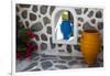 Greece, Santorini. Flower pots decorating a courtyard-Hollice Looney-Framed Photographic Print