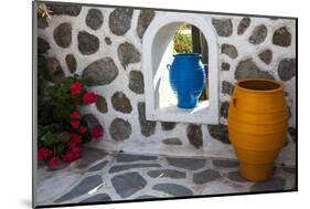Greece, Santorini. Flower pots decorating a courtyard-Hollice Looney-Mounted Photographic Print