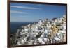 Greece, Santorini. The village of Oia glowing in the afternoon light.-Brenda Tharp-Framed Photographic Print