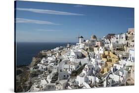 Greece, Santorini. The village of Oia glowing in the afternoon light.-Brenda Tharp-Stretched Canvas