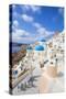 Greek Church with Three Blue Domes in the Village of Oia-Neale Clark-Stretched Canvas