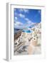 Greek Church with Three Blue Domes in the Village of Oia-Neale Clark-Framed Photographic Print