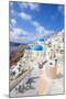 Greek Church with Three Blue Domes in the Village of Oia-Neale Clark-Mounted Photographic Print