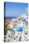 Greek Church with Three Blue Domes in the Village of Oia-Neale Clark-Stretched Canvas