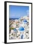 Greek Church with Three Blue Domes in the Village of Oia-Neale Clark-Framed Photographic Print