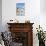 Greek Church with Three Blue Domes in the Village of Oia-Neale Clark-Photographic Print displayed on a wall