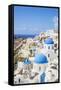 Greek Church with Three Blue Domes in the Village of Oia-Neale Clark-Framed Stretched Canvas