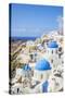 Greek Church with Three Blue Domes in the Village of Oia-Neale Clark-Stretched Canvas