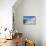 Greek Church with Three Blue Domes in the Village of Oia-Neale Clark-Photographic Print displayed on a wall