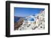 Greek Church with Three Blue Domes in the Village of Oia-Neale Clark-Framed Premium Photographic Print