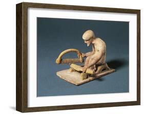 Greek Fictile Figurine of Carpenter at Work, from Boeotia, Greece, 5th Century B.C.-null-Framed Giclee Print