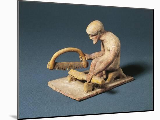 Greek Fictile Figurine of Carpenter at Work, from Boeotia, Greece, 5th Century B.C.-null-Mounted Giclee Print