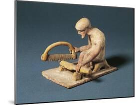 Greek Fictile Figurine of Carpenter at Work, from Boeotia, Greece, 5th Century B.C.-null-Mounted Giclee Print