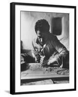 Greek Mountain Villager Engaged in Woodworking During the Winter-James Burke-Framed Photographic Print