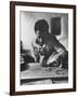 Greek Mountain Villager Engaged in Woodworking During the Winter-James Burke-Framed Photographic Print