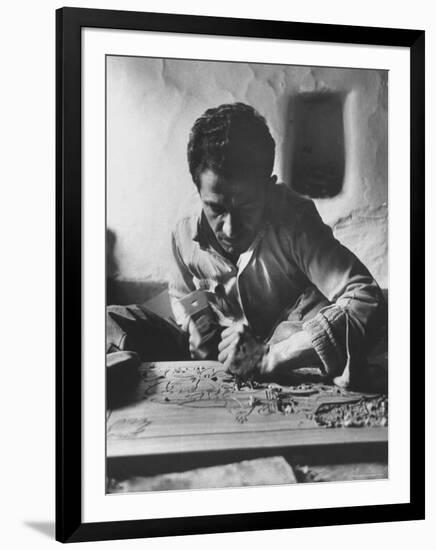 Greek Mountain Villager Engaged in Woodworking During the Winter-James Burke-Framed Photographic Print