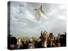 Greek Orthodox Priest Releases a Dove During a Traditional Ceremony at Jordan River Baptismal Site-null-Stretched Canvas